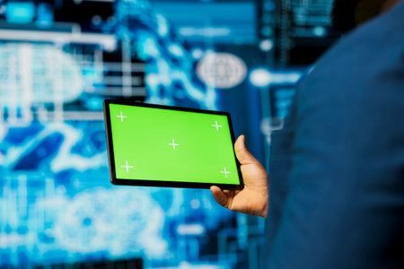 Professional guy in a high tech space uses mockup screen with AI modern tools, representing artificial intelligence data structures and intelligent systems. Innovation and cybernetics for science.の写真素材