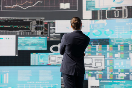 Business person reflecting on monthly company reports for development strategy, reviewing the complexity of business analysis with a focus on finance and forecasting, digital tools.の写真素材