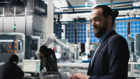 Solar panels industry technician in a high tech factory for inspection, quality control production...