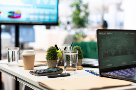 Empty modern office setup with advanced technology enhances productivity, helping professionals focus on financial strategies, performance metrics and global business objectives.の写真素材