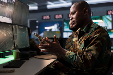 Operative conducing anti terrorism mission, putting bullets in pistol, preparing to attack enemy...