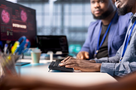 African american server farm worker in data center workplace.