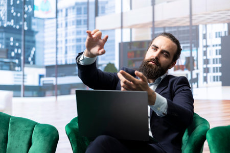 General director uses an AR hologram for analysis in his luxurious office, studying financial...