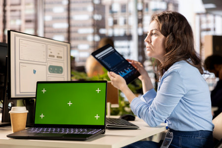 Executive analyst finalizing a report with data analytics next to copy space, developing a project...
