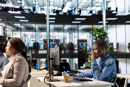 Businessman studying infographics and performance metrics for decision making, focused on project...