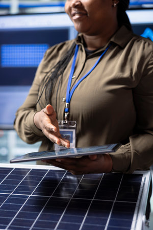 Industrial plant managers showcase product innovations in green energy sector in front of clients....