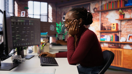 Tired admin in AI startup office having strained eyesight from overworking, getting help from senior...
