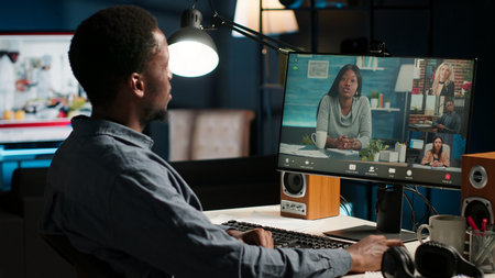 African american remote worker attending a web meeting call in a living room. Smiling black man...