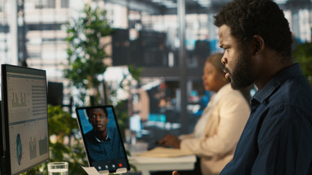 Manager chatting with worker in videoconference, setting goals for performance and company growth....