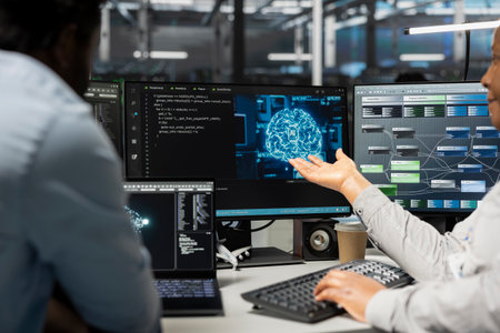Engineering team inspecting neural network data center used for machine learning. Teamworking...