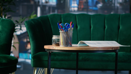 Business lobby featuring sofa in a bright modern boardroom with glass elements and high end furniture, organized for office life and structured to support meetings and corporate culture.の写真素材