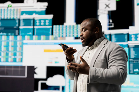 Business director discussing with people on a phone call to examine big data insight, working on infographics monthly reports. Working on new growth strategy, forecasting development.の写真素材