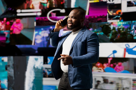 Smiling user answering a smartphone call next to mobile apps on screen, surrounded by visual elements of social engagement, and web communication. Connecting via social networking.の写真素材