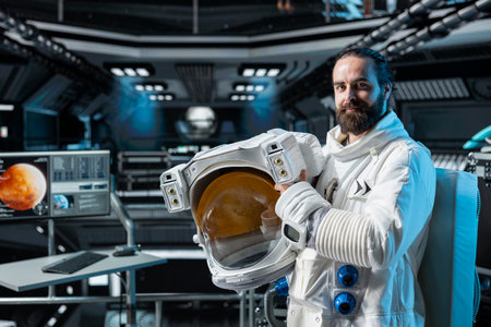Portrait of cosmonaut preparing for mission on Mars, doing space colonization. Man in orbital station beginning landing procedures on red desert planet, mapping unknown worldsの写真素材
