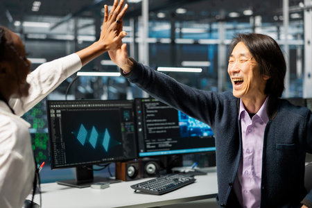 Engineers in data center celebrate successfully installing server systems with AI. Workers doing...