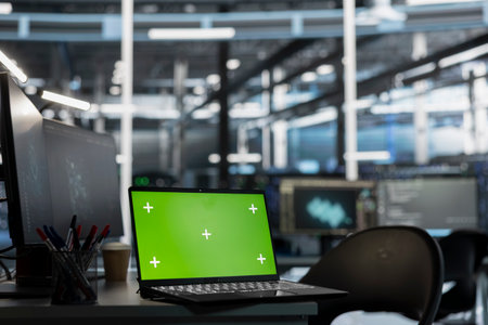 Green screen laptop monitoring data center gear delivering computing power for AI deep learning...