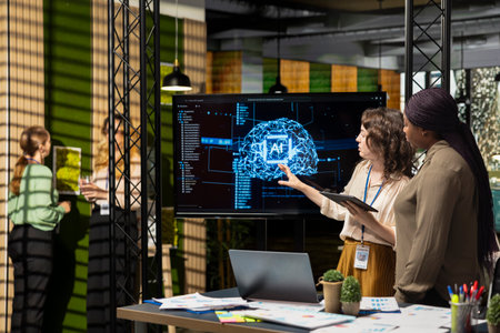 Powerful diverse team leveraging deep learning with big data algorithms, optimizing company performance with AI software and neural networks systems. Business solutions for growth.の写真素材