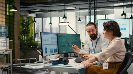 Business partners engaging in a discussion about financial forecasting and data insights, cheerful...