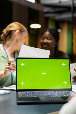 Close up of staff hosting a meeting with copy space on laptop, late night briefing conference to...
