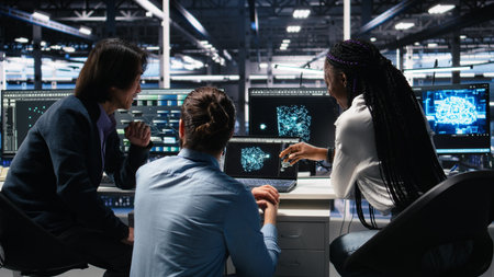 Server room computer scientists using AI to review infrastructure diagnostics. IT specialists working together in data center, analyzing performance data using artificial intelligence tech, camera Aの写真素材