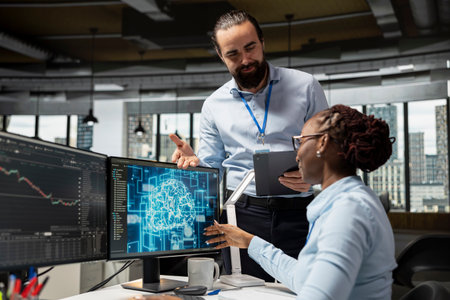 Smiling manager pleased by trader running AI technology on computer to do automated trading. Happy...