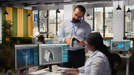 Team of engineers brainstorm upgrades for innovative solar powered device prototype. Research and...