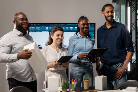 Portrait of multiethnic experts in real estate during collaborative meeting, analyze zoning regulations and site master plan for a property redevelopment project for infrastructure growth.の写真素材