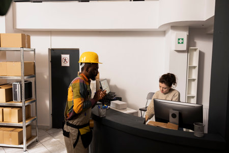 Diverse workers team focused on parcel preparation and storage management, checking the inventory...