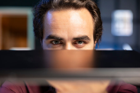 Close up shot of technology content creator filming review of newly launched gaming laptop. Internet star presenting notebook to subscribers, impressed by how sleek it isの写真素材