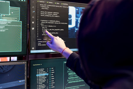 Close up of person coding on PC, using AI for security with script on computer