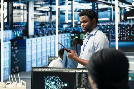 Data center technician looks at AI visualization dashboard to pinpoint equipment performance issues....