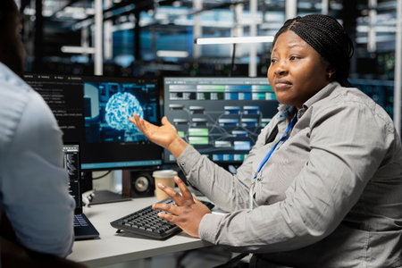 Server room engineering team doing brainstorming, using artificial intelligence to reduce downtime....