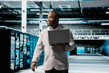 Technician in data center workspace running system diagnostic tests, monitoring performance....