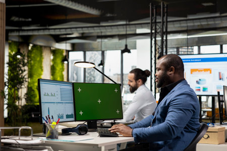 African american consultant focuses on business data next to copy space, working on general development within the corporate environment. Reviewing performance metrics for innovation.の写真素材