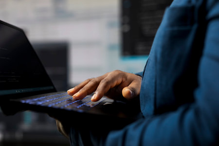 Young science expert evaluating algorithm design and binary code on a terminal window with high tech AI tools. Using programming language for automation and innovation, tech career.の写真素材