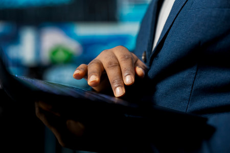 Modern concept of African American IT technician exploring artificial intelligence, showcasing machine learning algorithms, high tech neural networks and futuristic data structures.の写真素材