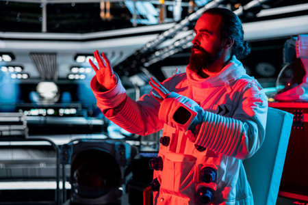 Astronaut freezing in place under red light alert, scared by alien threat emerging after disturbing...