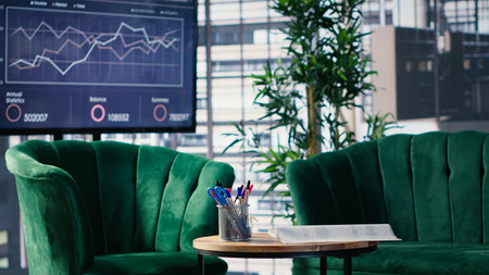 Clean empty office setup with modern furniture emphasizing preparation for a business conference, lighting, table and structured layout supporting professional workplace standards. Office life.の写真素材