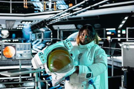 Jolly astronaut analyzing Mars planetary data in spacecraft powered by advanced engineering. Upbeat...