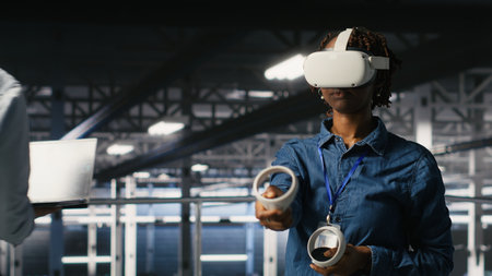 Engineer on data center industrial platform analyzing performance outputs using virtual reality...