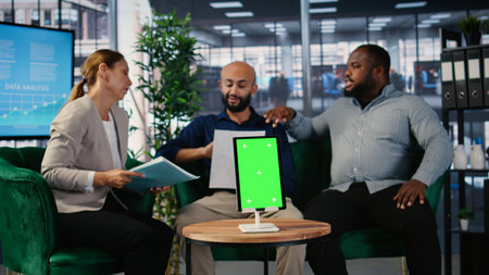 Confident CEOs group planning business development with isolated screen, analyzing performance and implementing decisions through structured analysis and leadership skills. Camera A.の写真素材