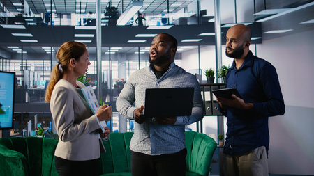 Diverse business leaders sharing their expertise for a new collaboration opportunity, discussing about performance metrics and insights for a success story. Strategic thinking.の写真素材