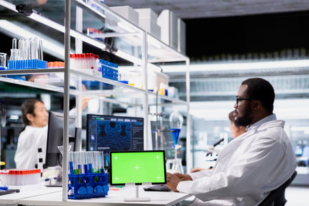 Mockup tablet app used by modern laboratory technician for DNA data analysis. Research facility...