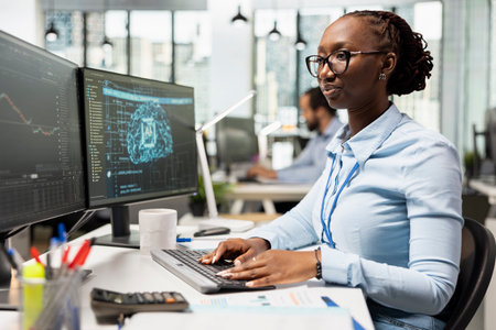 Trader in prop firm office using AI machine learning to analyze market data and execute trades using trading app on PC. Woman monitoring stock exchange using artificial intelligence techの写真素材