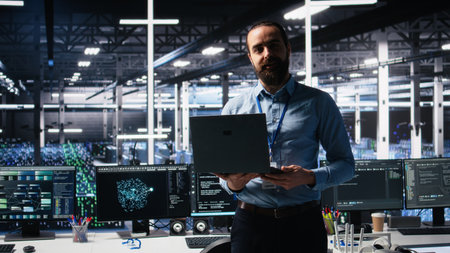 Data center manager presents AI technology to shareholders, demonstrating predictive maintenance capabilities. Man briefing investors on server hub artificial intelligence infrastructure, camera Aの写真素材