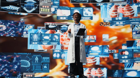 Smiling scientist speaking in mic, doing presentation on genomes, comparing diseases. Happy biomedical expert talks about pathogens and antiviral strategies during medical conference, camera Aの写真素材