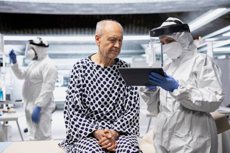 Medical scientist working in a virology unit with lab testing on contagious man, studying bacteria...