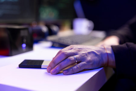 Close up of hacker holding SSD with undetectable malware used to get past antivirus protection....