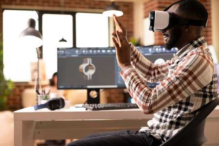 African american freelance developer immersed in VR, prototyping 3D clamp model. Black male engineer...