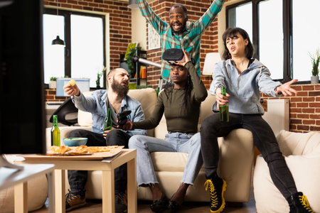 Black woman lifts AR headset, reacting angrily at TV screen after losing virtual reality game. Diverse male and female peers in living room express frustration and disappointment over 3D gaming loss.の写真素材